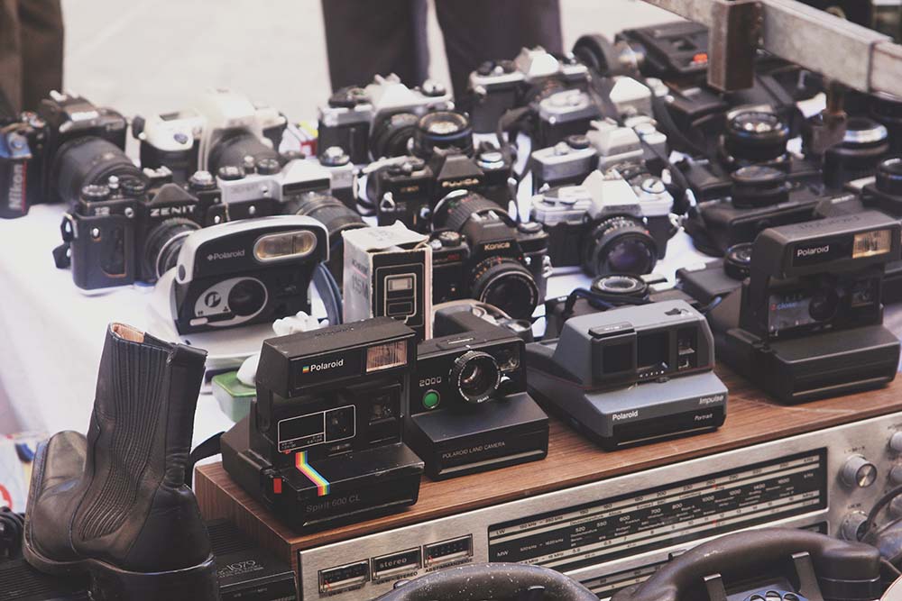 an assortment of used cameras